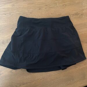 Lululemon Skirt with shorts. Size 4. Black.
